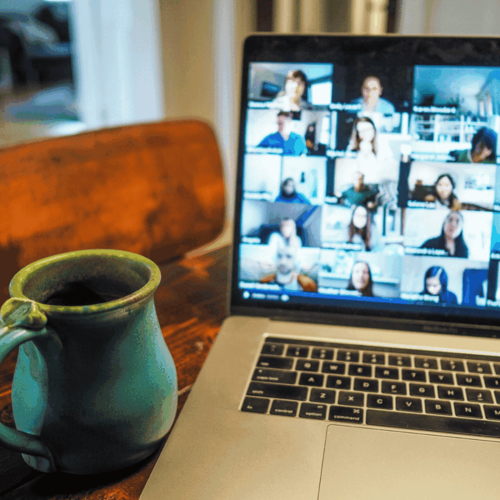 a coffee cup and laptop to show integrative healthcare diploma open evening webinar UK
